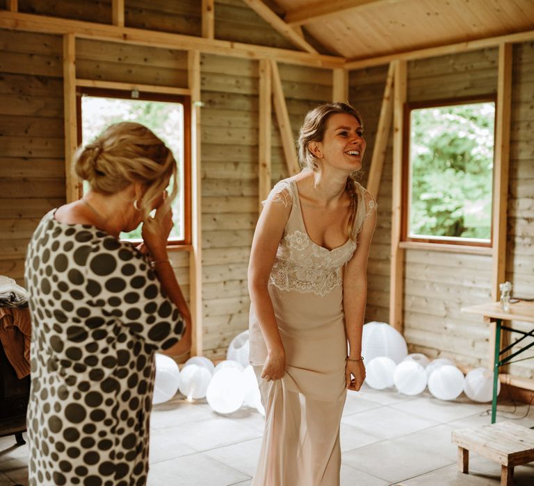 Bride In Bespoke Wedding Dress With Champagne Underlay