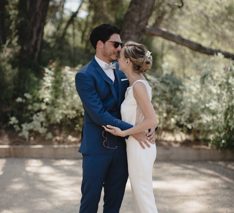 Bride in Nicolas Fafiotte Jumpsuit & Groom in Faubourg Saint-Sulpice Suit | Sebastien Boudot Photography