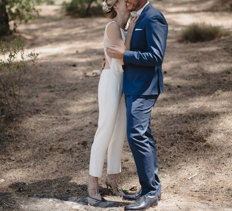 Bride in Nicolas Fafiotte Jumpsuit & Groom in Faubourg Saint-Sulpice Suit | Sebastien Boudot Photography