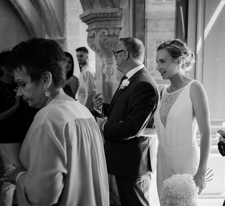 Bride in Nicolas Fafiotte Jumpsuit & Groom in Faubourg Saint-Sulpice Suit | Sebastien Boudot Photography