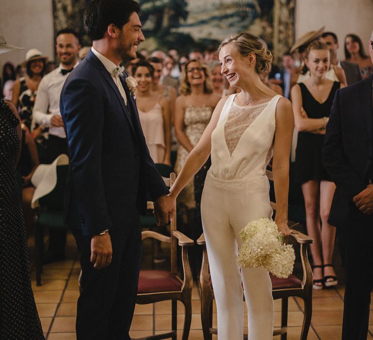 Bride in Nicolas Fafiotte Jumpsuit & Groom in Faubourg Saint-Sulpice Suit | Sebastien Boudot Photography