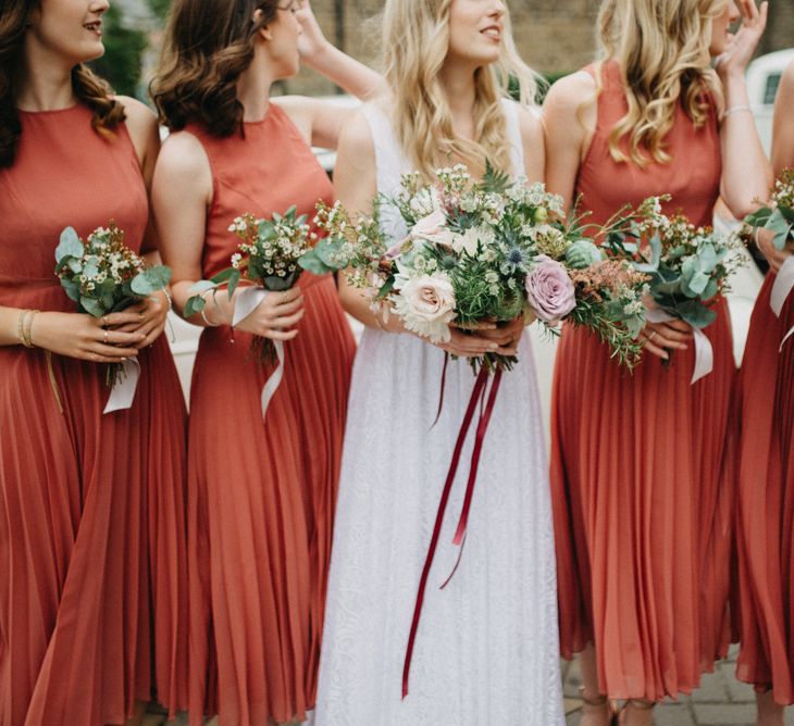 Bridesmaids In Rust Coloured Dresses