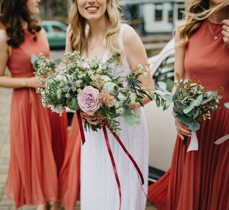 Bridesmaids In Rust Coloured Dresses