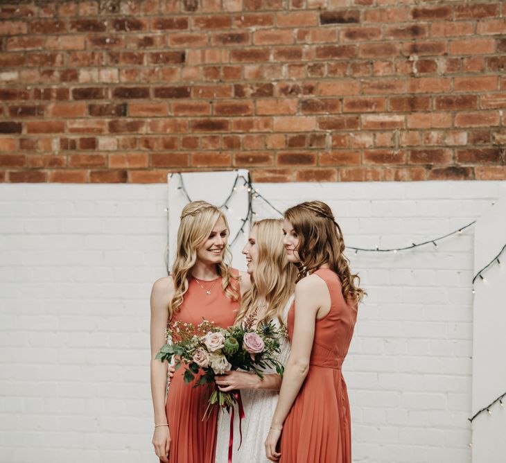 Bridesmaids In Rust Coloured Dresses