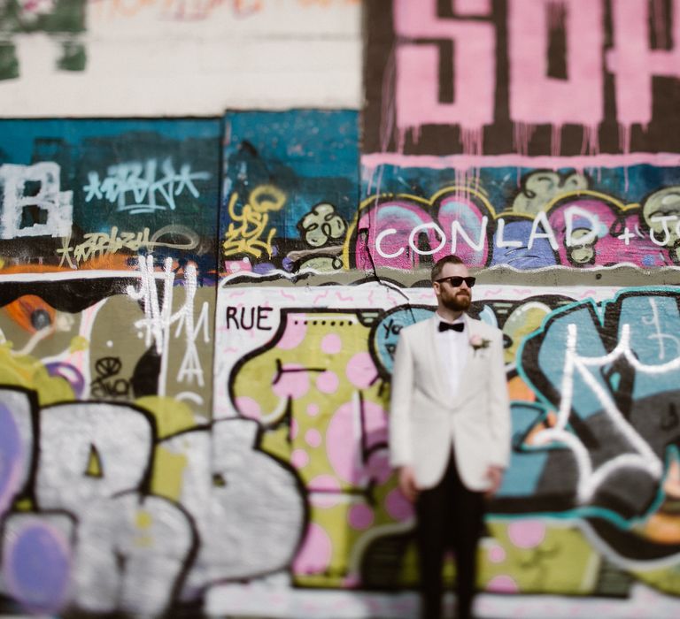 Groom in White Tuxedo Jacket