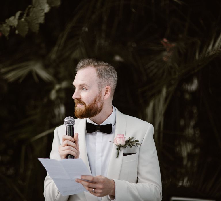 Groom in White Tuxedo Jacket