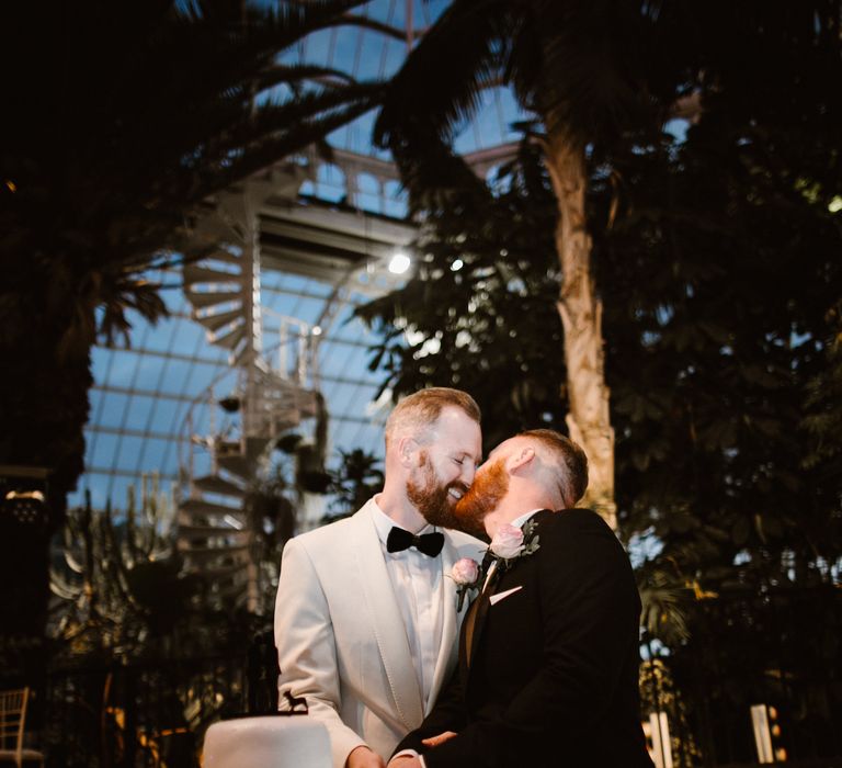 Groom & Groom Cutting the Cake