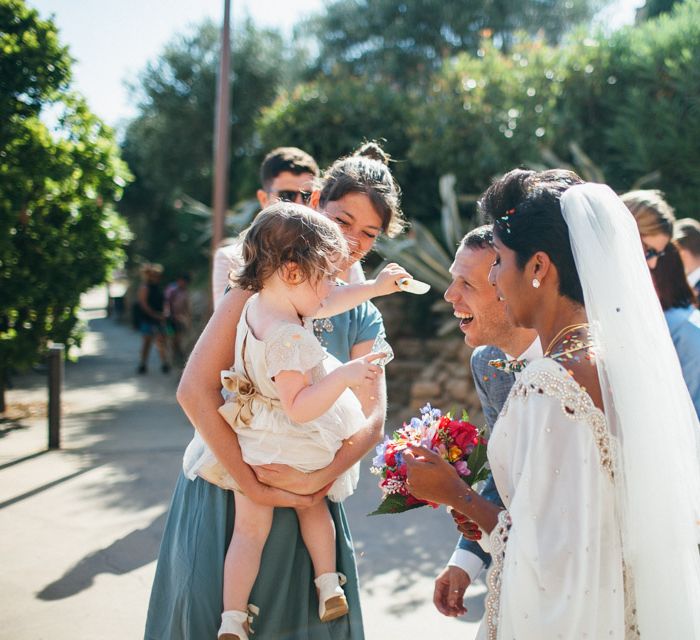 Bride In White & Gold Sari With Tulle Veil