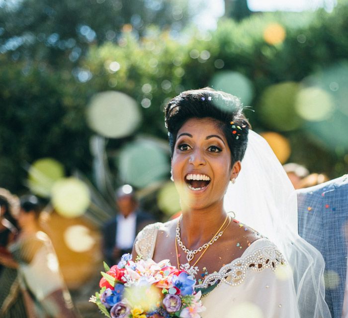 Bride In White & Gold Sari With Tulle Veil