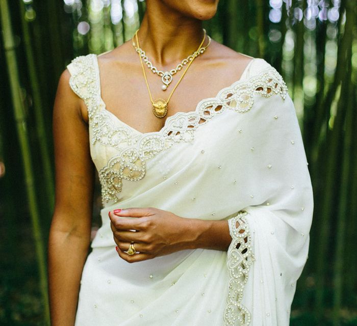 Bride in White & Gold Sari