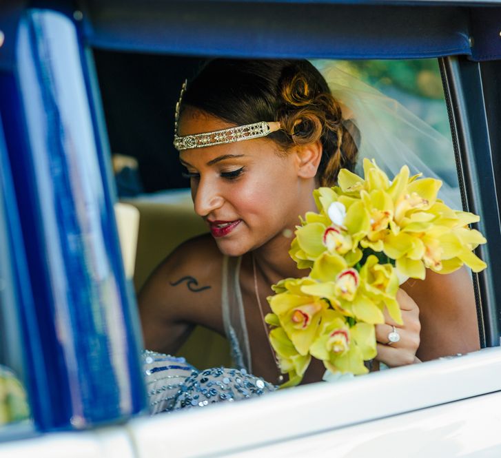 Bride With Orchid Wedding Bouquet