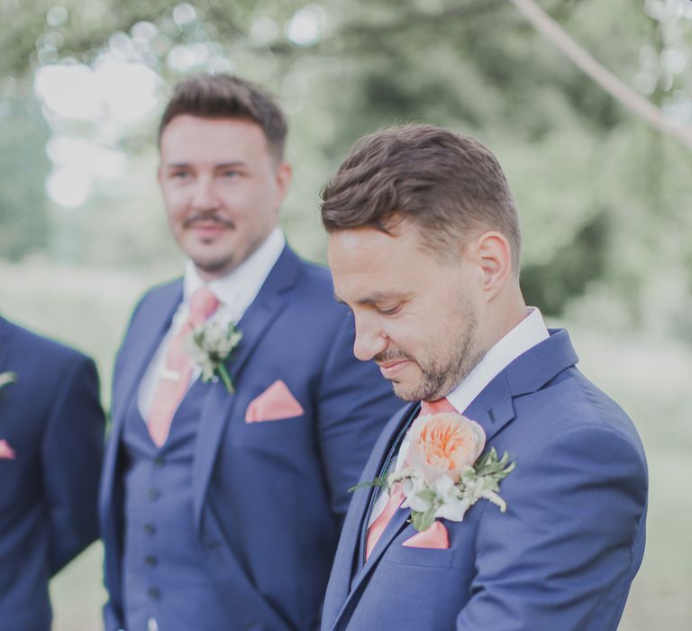 Wedding Ceremony | Groomsmen in Moss Bros Suits | Outdoor Peach Wedding at Courteenhall House in Northamptonshire Planned by Your Story Events | Ferri Photography