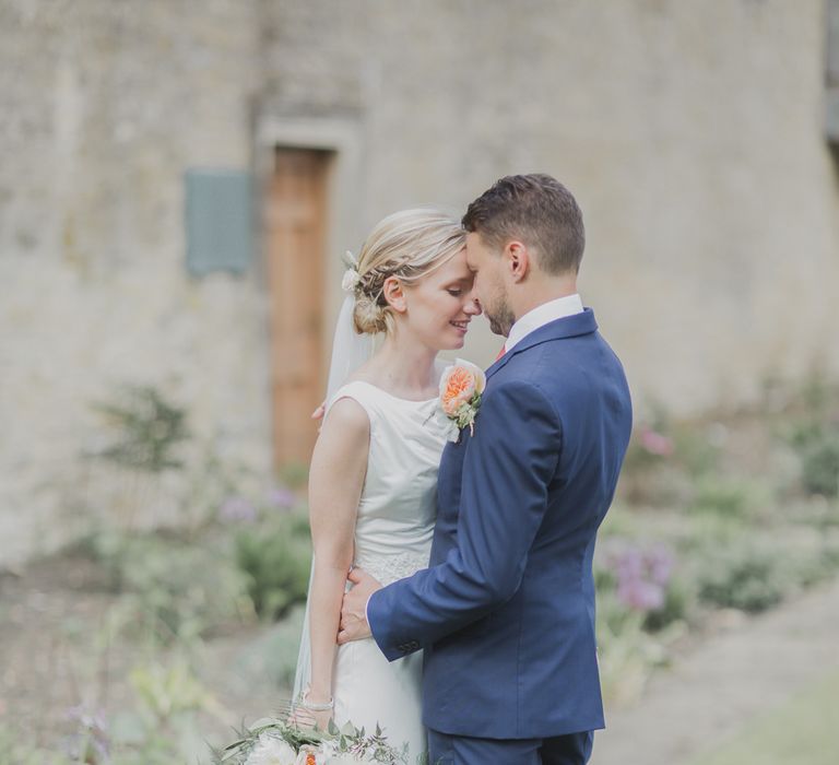 Bride in Justin Alexander Gown | Groom in Moss Bros Suit | Outdoor Peach Wedding at Courteenhall House in Northamptonshire Planned by Your Story Events | Ferri Photography