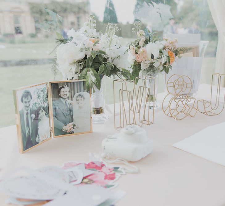 Guest Book Table Decor | Outdoor Peach Wedding at Courteenhall House in Northamptonshire Planned by Your Story Events | Ferri Photography