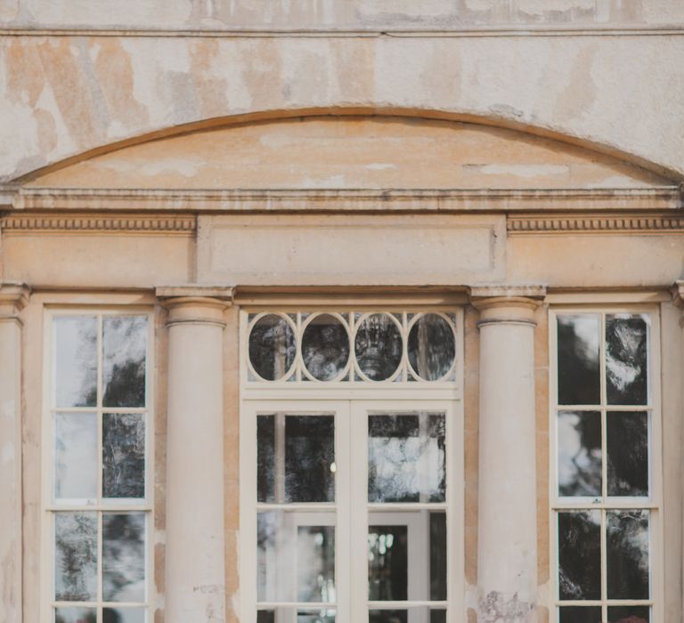 Bride in Justin Alexander Gown | Groom in Moss Bros Suit | Outdoor Peach Wedding at Courteenhall House in Northamptonshire Planned by Your Story Events | Ferri Photography