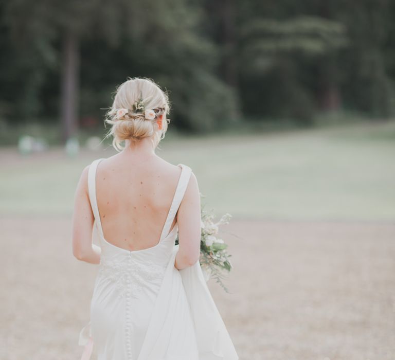 Bride in Justin Alexander Gown | Outdoor Peach Wedding at Courteenhall House in Northamptonshire Planned by Your Story Events | Ferri Photography