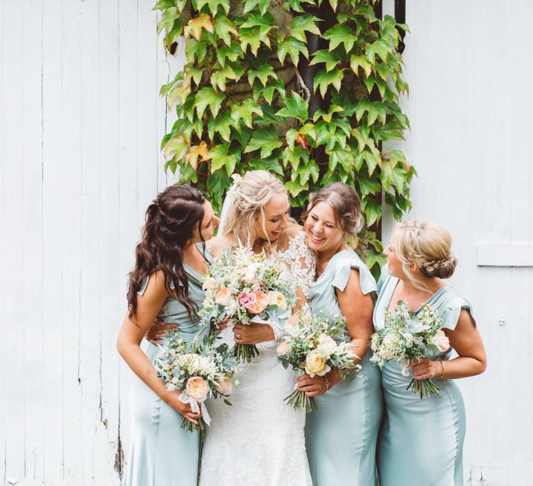 Bridesmaids in Mint Green Ghost Sylvia Dresses