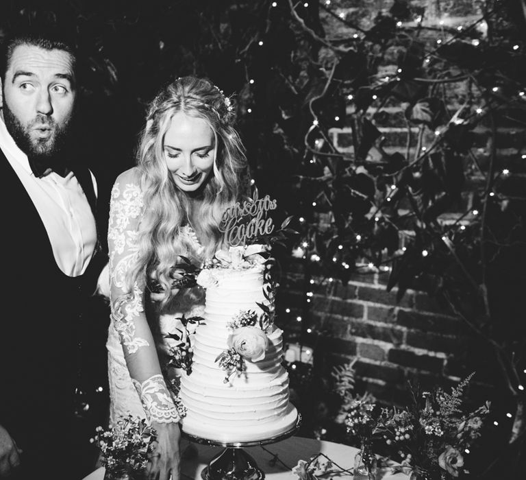 Bride & Groom Cutting the Wedding Cake