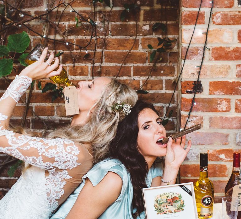 Bride & Bridesmaid in Ghost Sylvia Dress at the Gentleman's Station