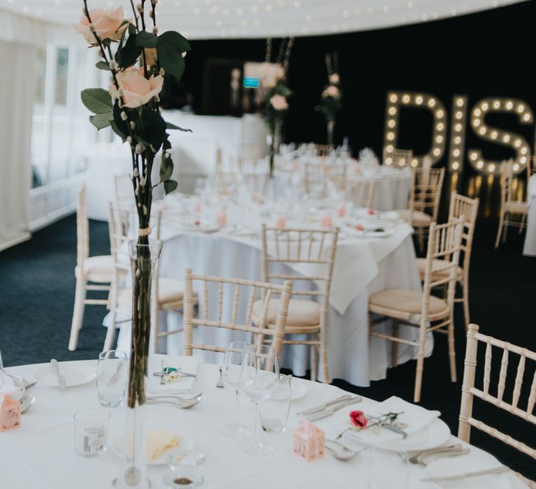 Tall Flower Stem Centrepiece | Classic Marquee Reception at Chippenham Park | Eliza Claire Photography