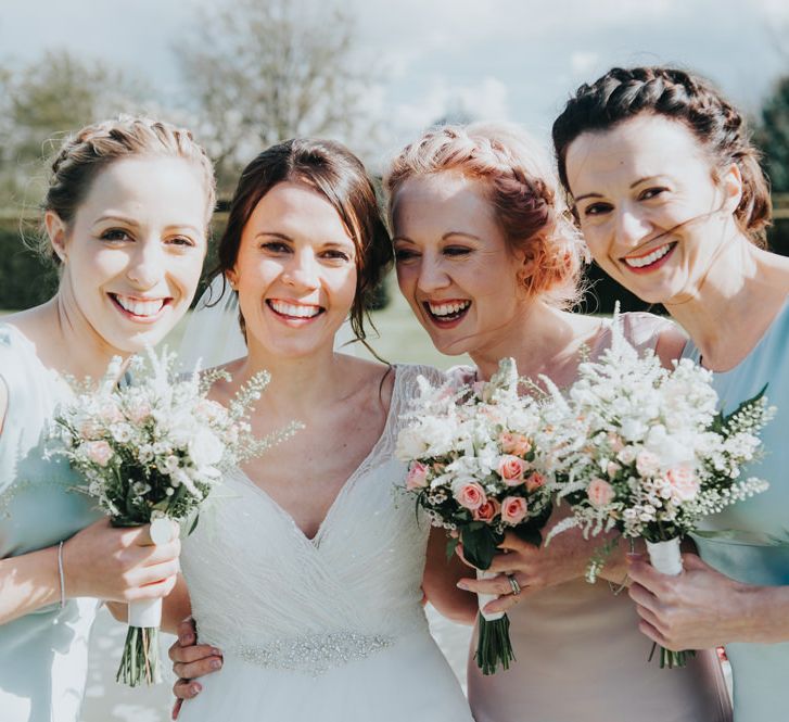 Bride in Sophia Tolli Bridal Gown | Bridesmaids in Pastel Ghost Dresses | Classic Marquee Reception at Chippenham Park | Eliza Claire Photography