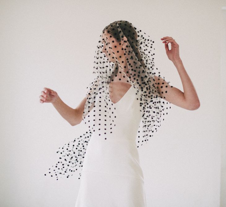 Black Polka Dot Wedding Veil By AM Faulkner // Minimal Elegant Bridal Inspiration Shoot With Ikebana Inspired Floral Arrangements By Kitten Grayson // Planned & Styled By Anemone Style // Images Genevieve Wedding Photography