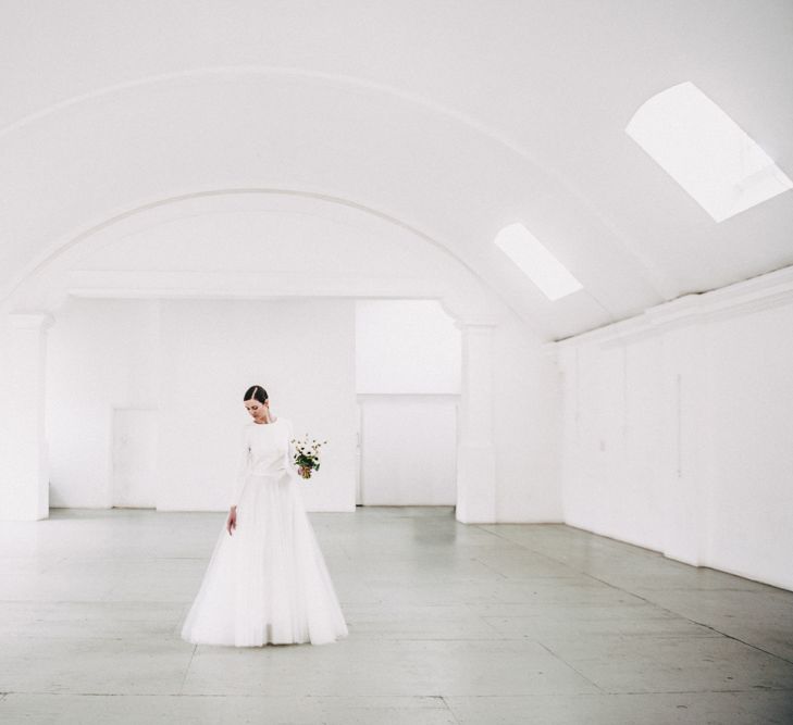 Warehouse Event Space London // Minimal Elegant Bridal Inspiration Shoot With Ikebana Inspired Floral Arrangements By Kitten Grayson // Planned & Styled By Anemone Style // Images Genevieve Wedding Photography