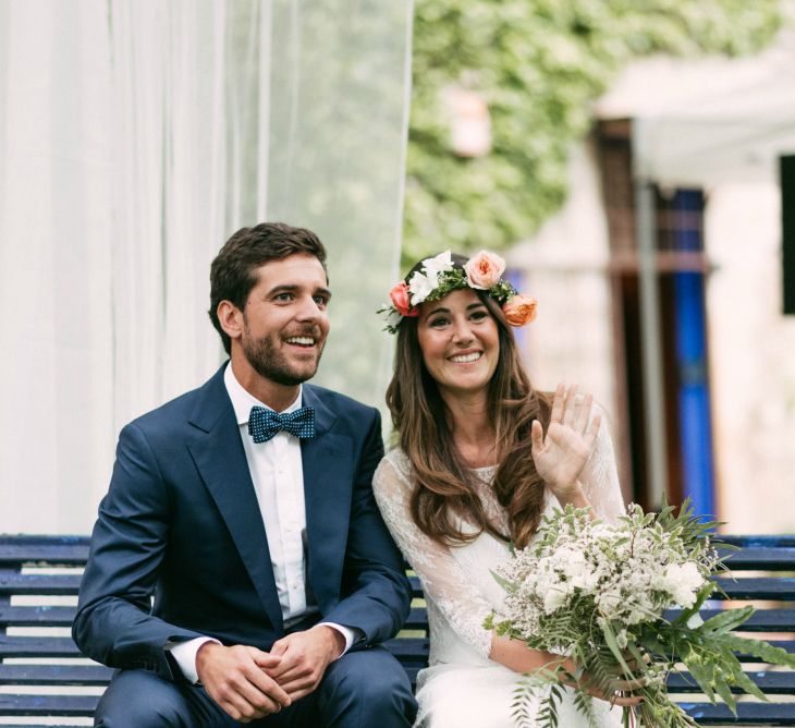 Spanish Outdoor Wedding Ceremony | Boho Bride in Veronica Miranda Bridal Separates & Flower Crown & Groom in Navy Suit & Bow Tie