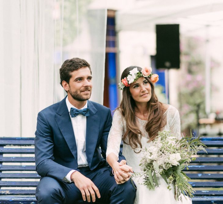 Spanish Outdoor Wedding Ceremony | Boho Bride in Veronica Miranda Bridal Separates & Flower Crown & Groom in Navy Suit & Bow Tie