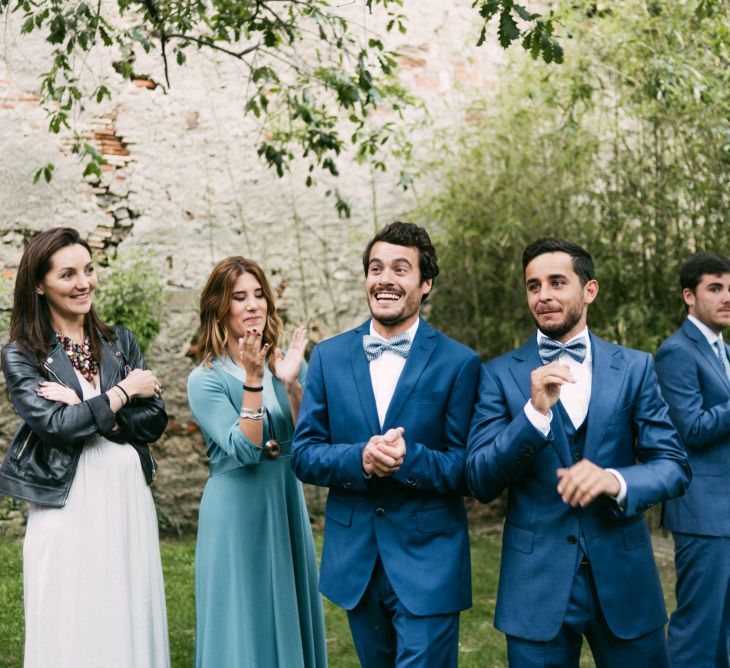 Groomsmen in Navy Suits & Bow Ties