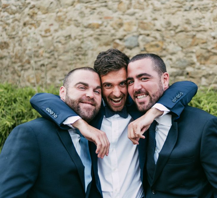 Groomsmen in Navy Suits