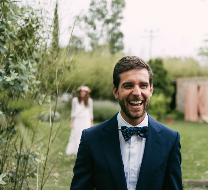 Dapper Groom in Suit & Bow Tie