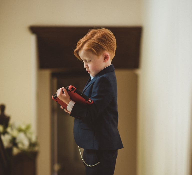 Page Boy in Next Suit & Converse