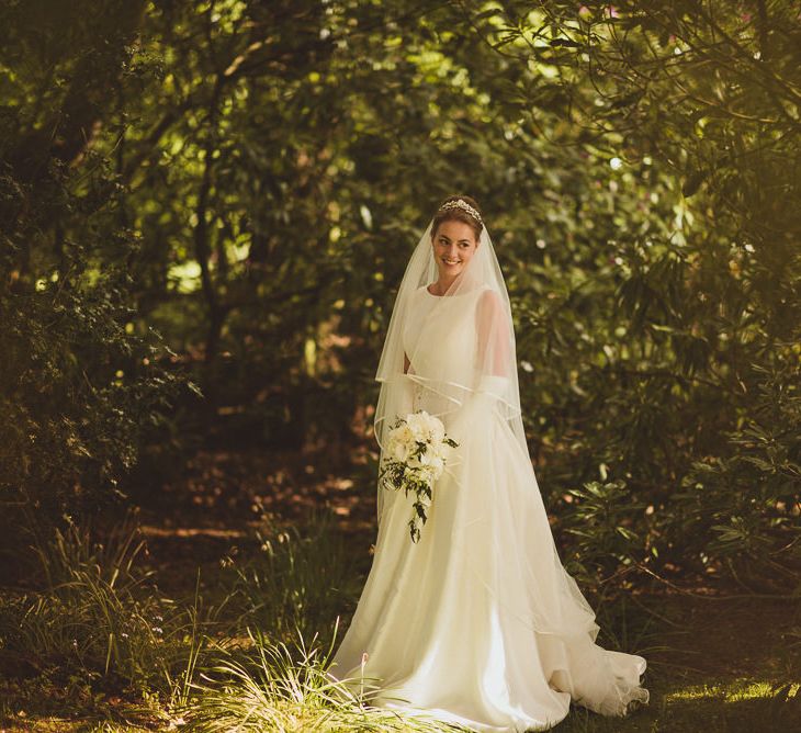 Bride in Tom Flowers Dress, Long Satin Gloves & Ivory & Co. Headdress