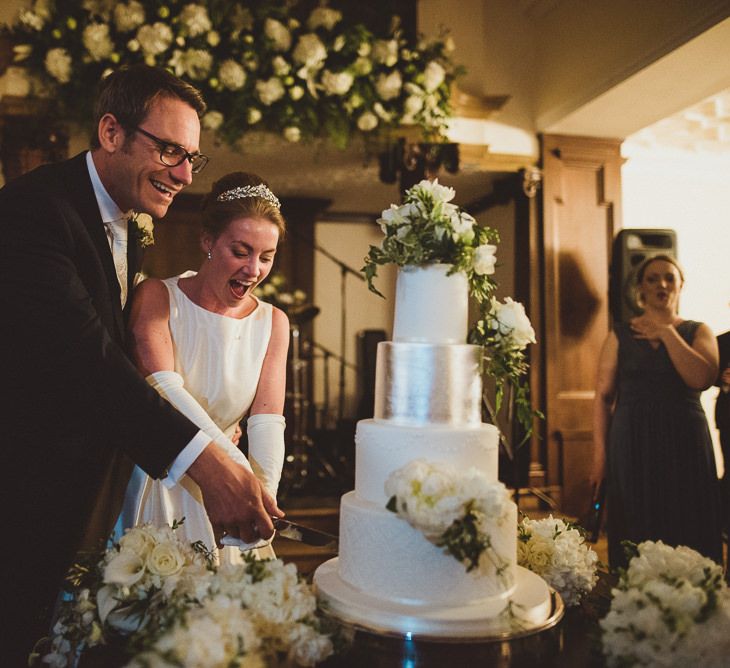 Bride & Groom Cutting the Cake