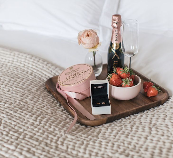 PANDORA rose gold earrings and breakfast tray