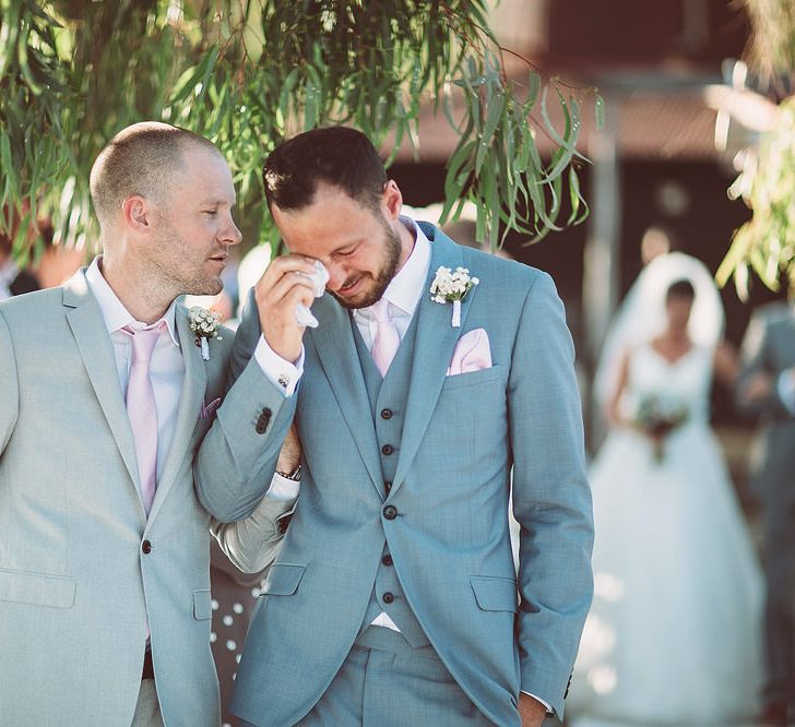 Emotional Groom in Blue Reiss Suit