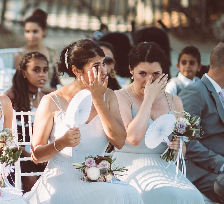 Emotional Bridesmaids wearing Pale Blue Pleated ASOS Dresses