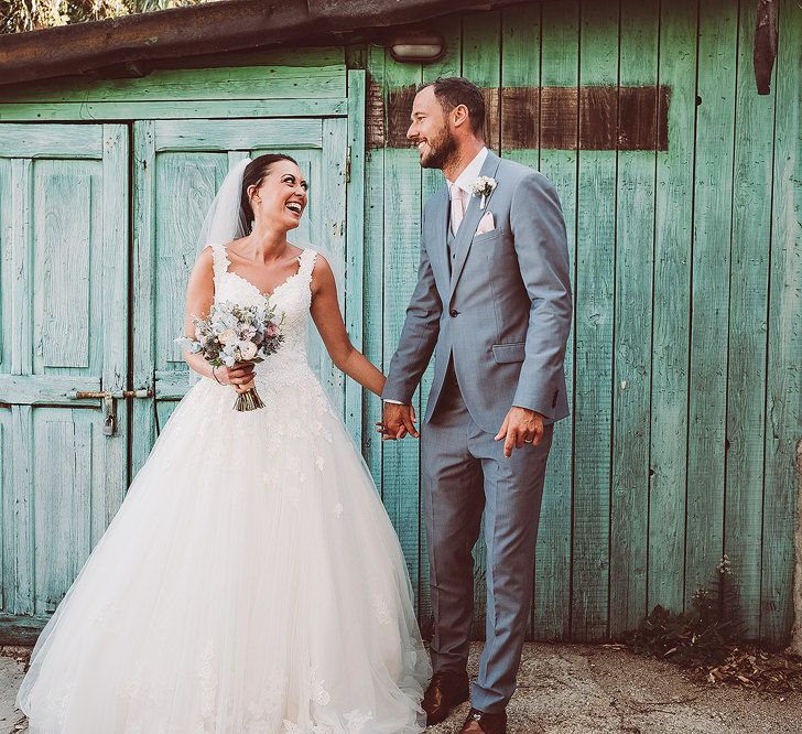 Bride in Essense of Australia (D1919) Wedding Dress & Groom in Blue Reiss Suit