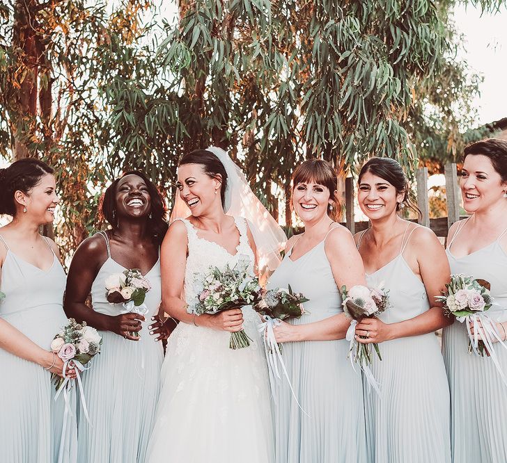 Bridesmaids in Pale Blue Pleated Skirt Dresses from ASOS