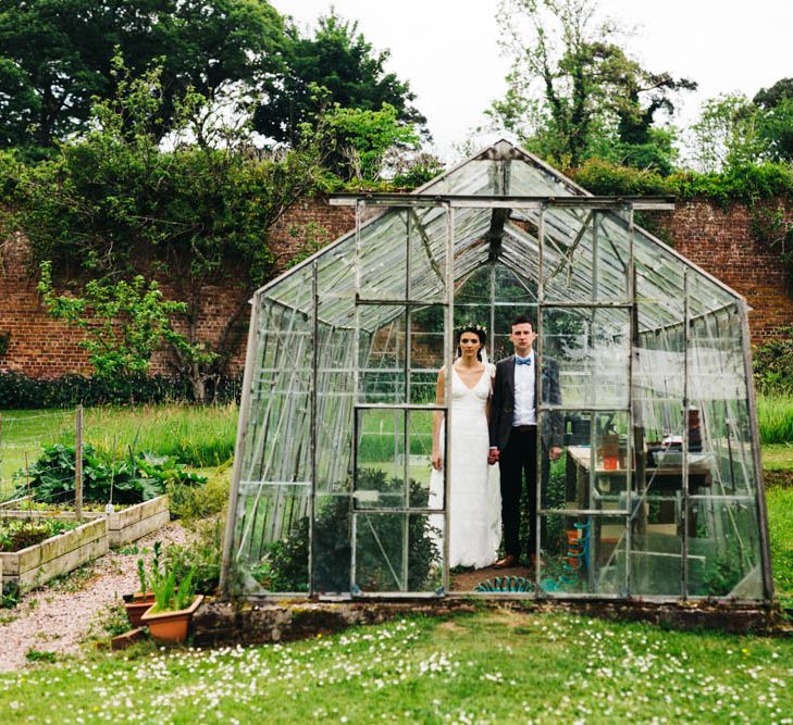 Bride & Groom Green House Portrait