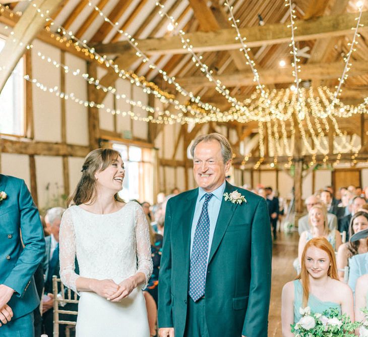 Wedding Ceremony | Bride in Fred & Ginger Bridal Design Gown | Groom in Navy Mullen Mullen Suit | Pastel Spring Wedding at Loseley Park Barn | Sarah-Jane Ethan Photography | Captured Media Weddings Film