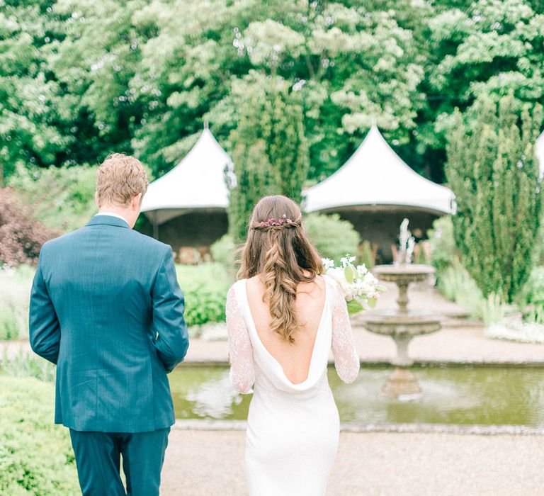 Bride in Fred & Ginger Bridal Design Gown | Groom in Navy Mullen Mullen Suit | Pastel Spring Wedding at Loseley Park Barn | Sarah-Jane Ethan Photography | Captured Media Weddings Film