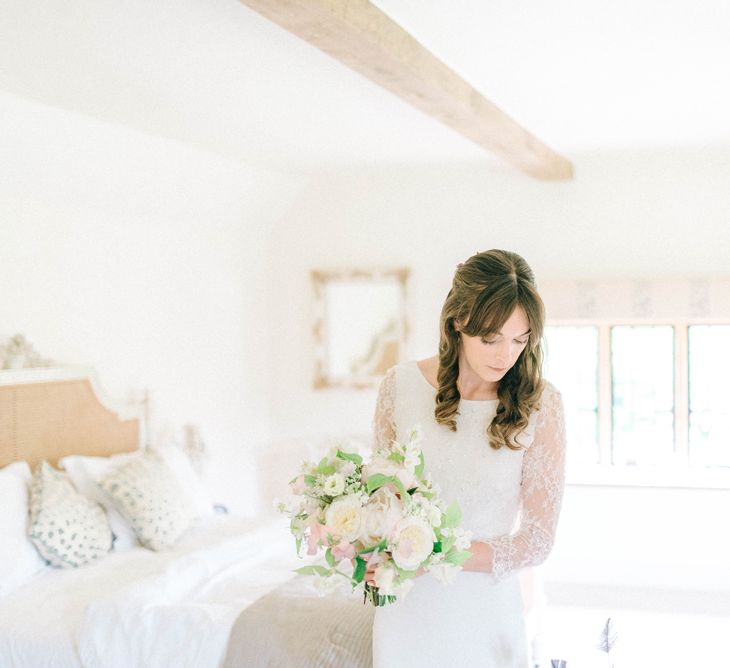 Bridal Preparations | Bride in Fred & Ginger Bridal Design Gown | Pastel Spring Wedding at Loseley Park Barn | Sarah-Jane Ethan Photography | Captured Media Weddings Film