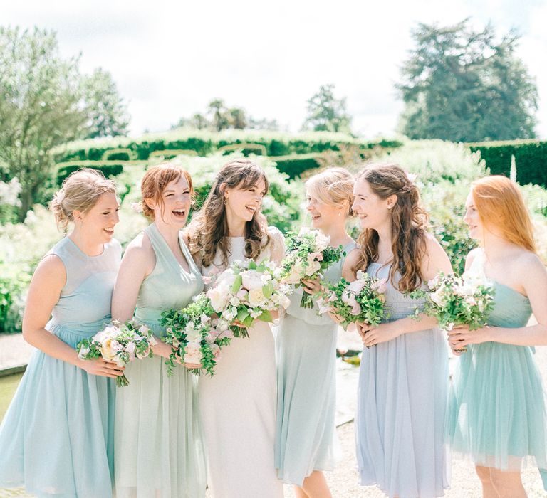 Bride in Fred & Ginger Bridal Design Gown | Bridesmaids in Pale Blue & Green Dresses | Pastel Spring Wedding at Loseley Park Barn | Sarah-Jane Ethan Photography | Captured Media Weddings Film