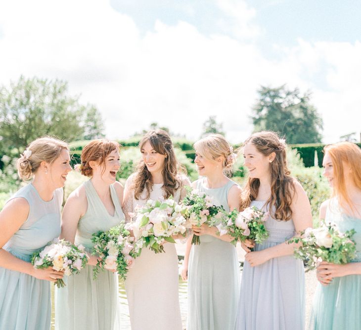 Bride in Fred & Ginger Bridal Design Gown | Bridesmaids in Pale Blue & Green Dresses | Pastel Spring Wedding at Loseley Park Barn | Sarah-Jane Ethan Photography | Captured Media Weddings Film