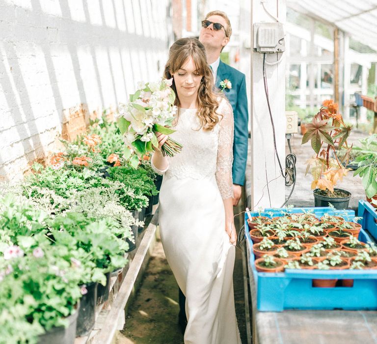 Bride in Fred & Ginger Bridal Design Gown | Groom in Navy Mullen & Mullen Suit | Pastel Spring Wedding at Loseley Park Barn | Sarah-Jane Ethan Photography | Captured Media Weddings Film