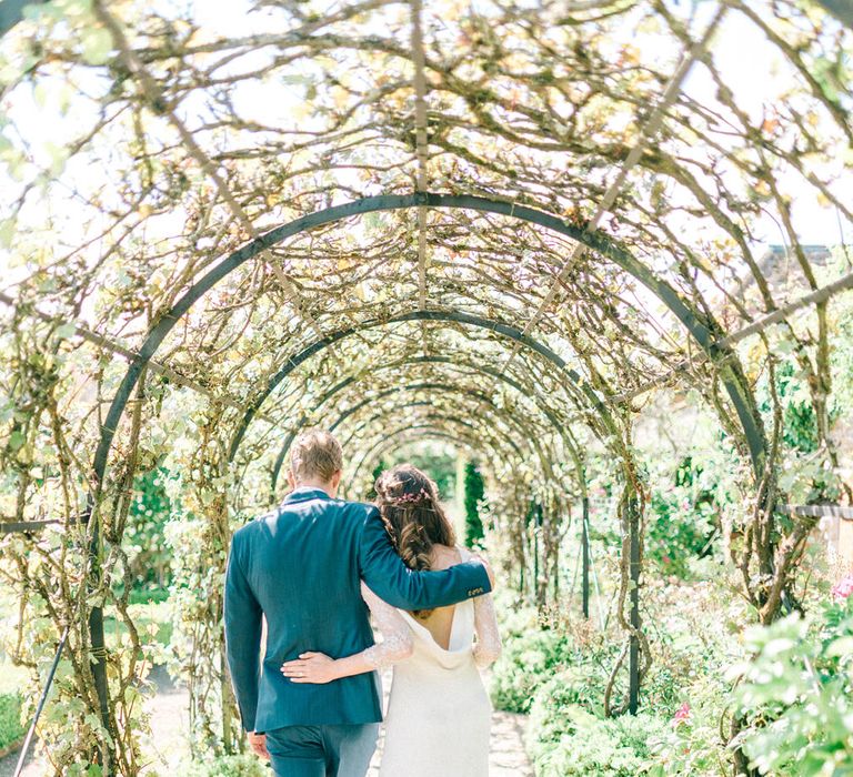 Bride in Fred & Ginger Bridal Design Gown | Groom in Navy Mullen & Mullen Suit | Pastel Spring Wedding at Loseley Park Barn | Sarah-Jane Ethan Photography | Captured Media Weddings Film