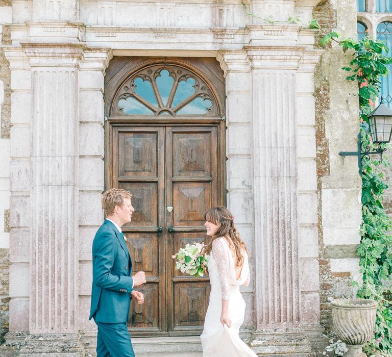 Bride in Fred & Ginger Bridal Design Gown | Groom in Navy Mullen & Mullen Suit | Pastel Spring Wedding at Loseley Park Barn | Sarah-Jane Ethan Photography | Captured Media Weddings Film