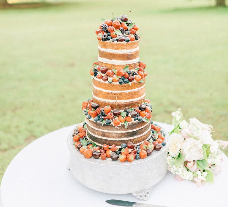 Naked Wedding Cake with Fruit | Pastel Spring Wedding at Loseley Park Barn | Sarah-Jane Ethan Photography | Captured Media Weddings Film